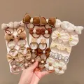 10Pcs/Set Girls Cartoon Hair Band Bow Hair Ties Flower Headbands Princess Elastic Rubber Bands Kids Hair Accessories. 