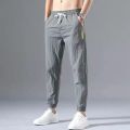 New Mens Trousers Summer Ice Silk Thin Green Color Fashion Elastic Waist Nine Points Length Pants Men Casual Sports Joggers Pant. 