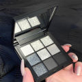 Ggmm Suke 9 Colors Eyeshadow Palette metallic white gray black eyeshadow palette with mirror.