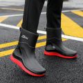The new rain boots men's work kitchen anti-slip water shoes can be worn in all seasons waterproof rain boots can be worn outside the work vegetable field fashion shoes. 