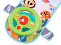 Children's interactive steering wheel on the front seat for a car with HOLA melodies. 