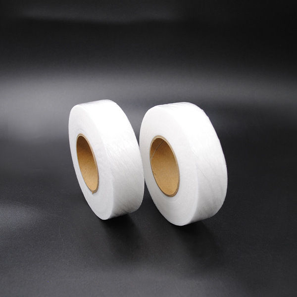50%20feet%20Interlining%20Adhesive%20Tape%20Double-sided%20Non-woven%20Clothes%20Ironing%20Hem%20Tapes%20DIY%20Sewing%20Interlining%20for%20Shorten%20Repair%20Pants%20-%20Image%203