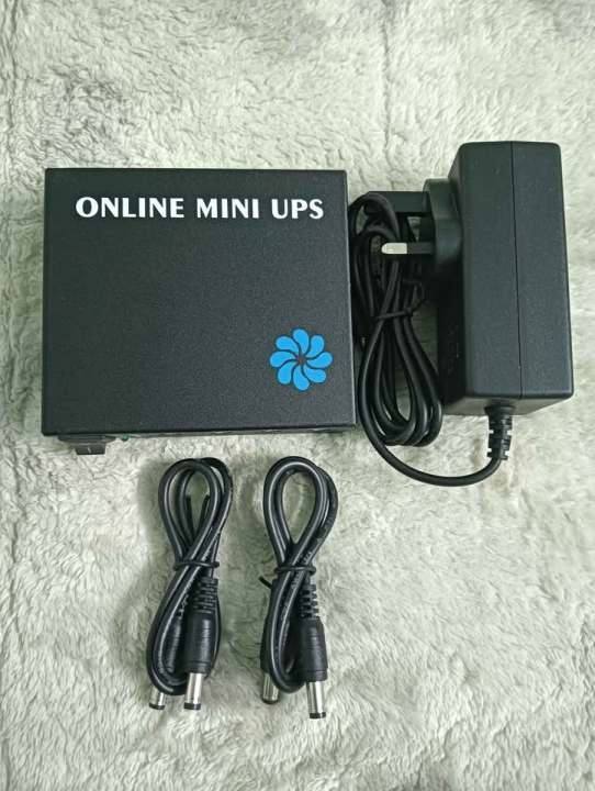 Mini%20Ups%20Output%2012V/12V/9V%206000Mah%20Battery%20For%20Wifi%20Router%20Onu%20%20Etc%20Backup%20up%20to%205%20Hours%20With%206%20Month%20Seller%20Warranty%20-%20Image%202