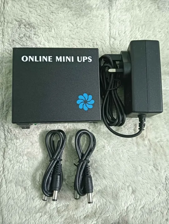 Online%20Mini%20Ups%2012V/12V/9V%206000mAh%20Powerful%20Lithium%20Ion%20Battery%20With%20Charger%20For%20Wifi%20Router%20%7C%20Onu%20%7C%20Access%20Control%20And%20Ip%20Camera%20With%20Charger%20-%20Image%202