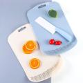 Kitchen plastic cutting board multifunctional cutting board draining chopping board. 