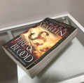 Fire & Blood  (  A Targaryen History #1  )   (  Book by George R.R. Martin  )   (  Premium Paper and Matte Cover  ). 