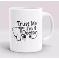 TRUST ME I AM A DOCTOR PRINTED COFFE MUG. 