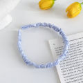 Fresh pearl headband spring fragrance face wash hairpin simple twist braided fabric pressed hair headband hair accessories for women.
