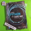 Learn Python the Hard Way (Zed Shaw's Hard Way Series) by Zed Shaw. 
