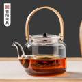 1000ml wooden handle Borosilicate Glass Teapot, Loose Leaf Tea Kettle, Borosilicate Glass Heat Resistant Clear Leaf Teapot with glass Infuser Strainer for Microwavable and Stovetop Safe.