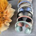 New cross-border macaron CXT-01 head-mounted wireless bluetooth headset foldable telescopic factory direct wholesale.