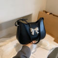This year's popular bow handbag bag women's 2024 spring and summer new fashion foreign shoulder armpit small square bag. 