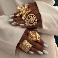 Enacolor 4Pcs/Set Retro Gold Irregular Alloy Flowers Ring Set Joint Rings for Women Exaggeration Jewelry Accessories Gifts.