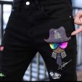 Men's Autumn New European Station Personality Trend Head Print Rhinestone Casual Ankle Banded Pants Denim Trousers Men. 