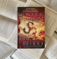 Fire & Blood  (  A Targaryen History #1  )   (  Book by George R.R. Martin  )   (  Premium Paper and Matte Cover  ). 