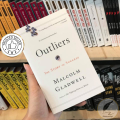 Outliers: The Story of Success by Malcolm Gladwell - Yellow - Paperback. 