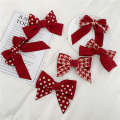 Simple polka dot checkered bow spring clip sweet versatile New Year red accessory Japanese and Korean hair clip at back of the head.