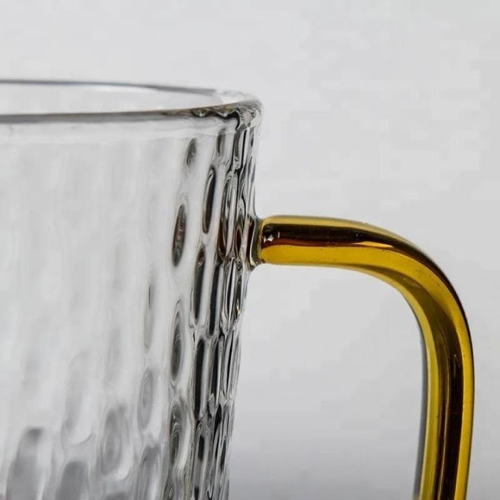 Premium%20Borosilicate%20Glass%20Mug%20with%20Large%20Yellow%20Handle,%20Funnel%20Shape,%20Dishwasher%20Safe%20-%20Lightweight,%20Classic%20Style,%20400ml%20Capacity,%20Clear%20Round%20Glass%20for%20Tea,%20Coffee,%20and%20Cold%20Drinks.%20-%20Image%205
