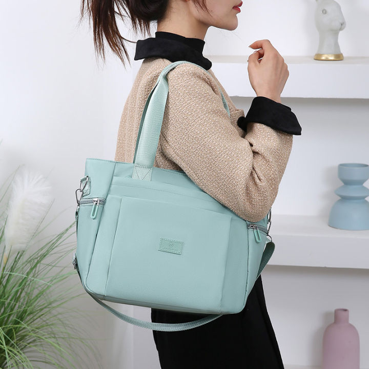 Large%20Capacity%20Handbag%20Women's%202024%20New%20Versatile%20Oxford%20Cloth%20Shoulder%20Bag%20Lightweight%20Crossbody%20Bag%20Handheld%20Multipurpose%20Women's%20Bag%20-%20Image%204