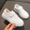 Children's school performance small white shoes velcro soft-soled sneakers spring and autumn boys and girls low-top casual shoes.