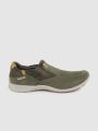Woodland Solid Slip-on Sneakers for Men - 3244119 Olive Green. 