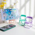 2023 New Mini Cell Phone Stand Universal Chair Desktop Mobile Phone Tablet Holder Folding Convenient Cute Phone Accessories. 