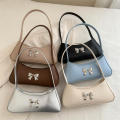 Handbag Chic Bow Pu Leather Shoulder Bag French Design Textured Underarm Bag for Women Evening Casual Party Gift.