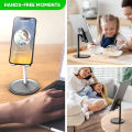 FLOVEME Universal Rotatable Desk Mobile Phone Stand Portable And Light Weight Compatible For Smart Phone And Tablet Device - Phone Stand. 