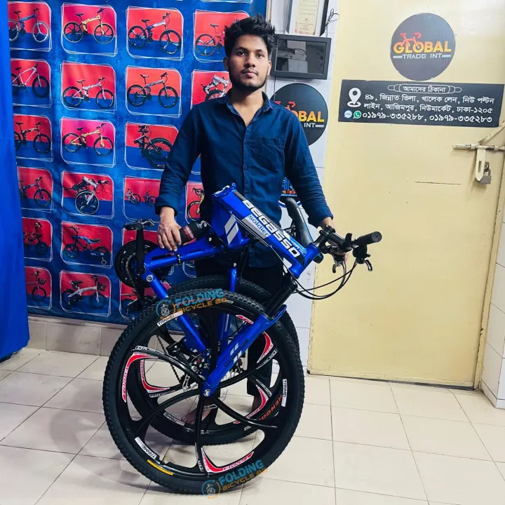 Begasso%20Folding%20Bicycle%20%7C%2026%20Inch%20%7C%20Alloy%20Wheel%20%7C%206%20Nives%20%7C%20Double%20Suspension%20%7C%20Shimano%20Gear%20&%20Brake%20%7C%20Double%20Disk%20Brake%20%7C%20Blue%20color.%20-%20Image%204