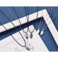 1 Pair Magnetic Couple Cord Necklaces Set with Heart Pendants for Men and Women.