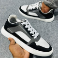 Elevate Casual Looks with Sneakers for Men - Casual Shoes in White, Black, and Ash Colors - Ideal for Every Season.