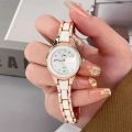 Elegant Quartz Business Watch for Women with Rose Gold Case and White  Strap. 