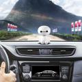 Baymax Robot Shaking Head Car Ornament: Cute and Playful Dashboard Decor - Nodding Ornaments to Inject Fun and Character into Your Commute.