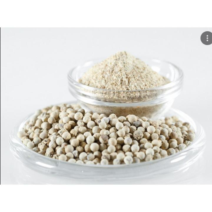 Ground white pepper isolated in white. 25g