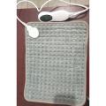 Electric Heating Pad.