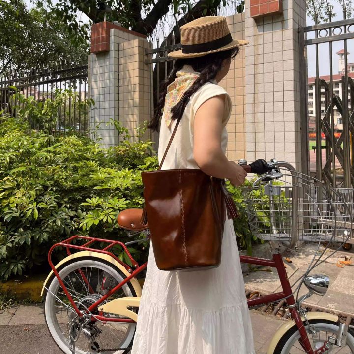 Paloma Wool first layer of oil wax cowhide vintage one-shoulder crossbody tassel bucket bag white Baihe same women's bag