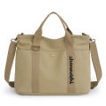 New cross-border women's bag, large capacity canvas handbag, simple casual shoulder bag, fashionable short-distance lightweight travel bag.