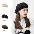 Black beret new women's autumn and winter Japanese face show small woolen octagonal hat ins painter hat big head hat.