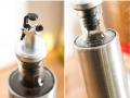 Rubber Olive Oil Free Flow Dispensers Caps for Bottle Pourers (Black, Silver), Set of 2. 