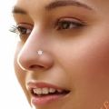 Gold Plated Flexible Nose Pin with 7 AD Zirconia Stones Elegant Stylish Design for All Sizes Durable Fashion Accessory with White Stones. 