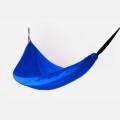 The camping hammock made of parachute fabric, lightweight, portable,  suitable for camping and outdoor activities. Two tree straps and a long rope are available for hanging.. 