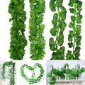 Green Leaf Banner Wall Background Artificial Hanging Plants for Wedding Party Garden Wall Decoration. 