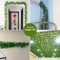 Green Leaf Banner Wall Background Artificial Hanging Plants for Wedding Party Garden Wall Decoration. 