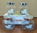 Small Storage Glass Bottles 4 Pieces Set With Lid. 