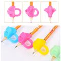 4pcs Children Writing Pencil Pan Holder Kids Learning Practise Silicone Pen Aid Grip Posture Correction Device for Students New. 
