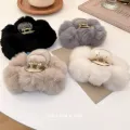 TS South Korea ins cute plush ball grab clip 2023 autumn and winter new shark clip oversized hairpin hair accessories wholesale. 