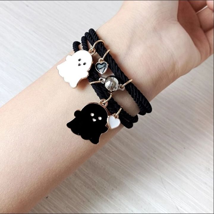 Trendy%20Black%20and%20White%20Halloween%20Couple%20Bracelets%20with%20Love%20Heart%20Pendant%20-%20Adjustable%20Rubber%20Band,%20Matching%20Set%20-%20Image%206