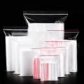 100Pcs Plastic Poly Bags Grip Self Seal Resealable Zip Lock Food Bag Organizer Adhesive Seal Bags for Kitchen. 