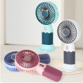 Mini USB Rechargeable Handheld Cooling Fan with Mobile Phone Holder - Ideal for Office, Home, and Summer Use. 