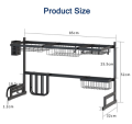 Double sink stainless steel dish drying rack over sink with cutlery holder. 